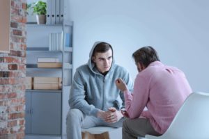 man being supported during cbt therapy