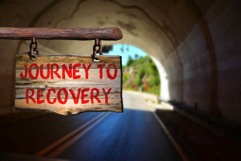 journey to recovery sign under a tunnel