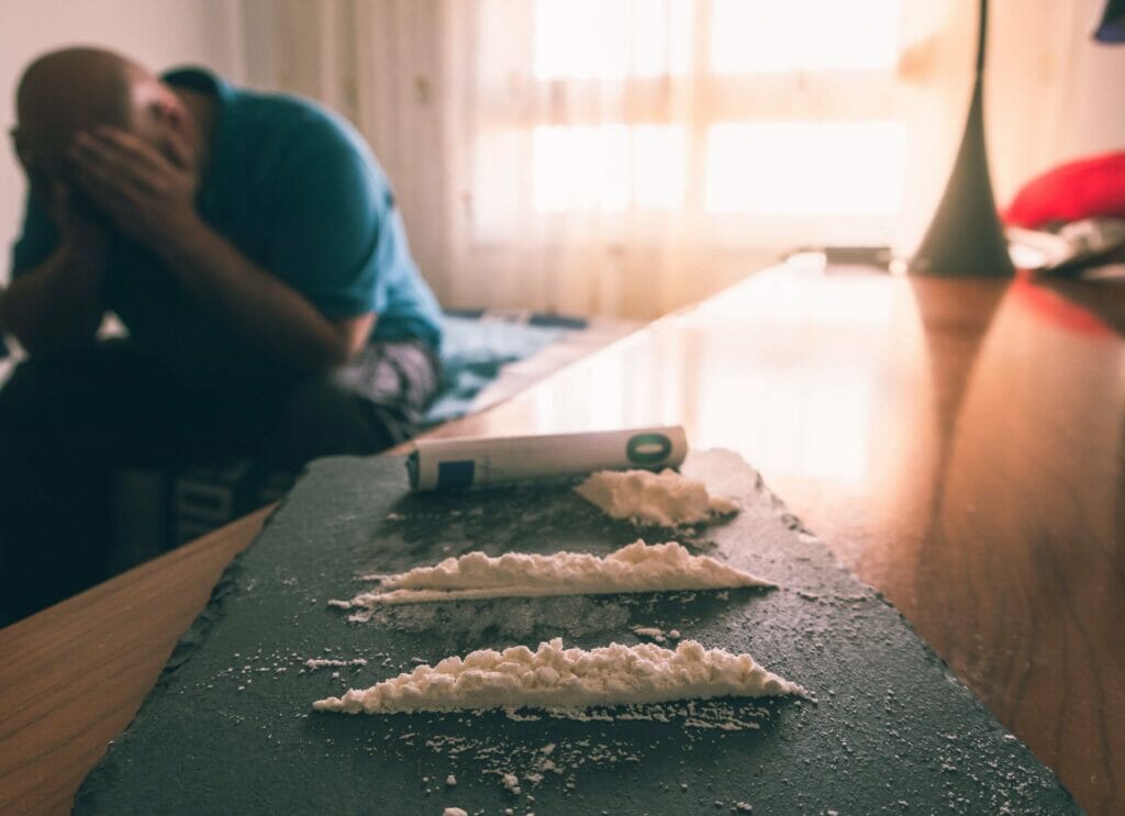depressed man addicted to using cocaine